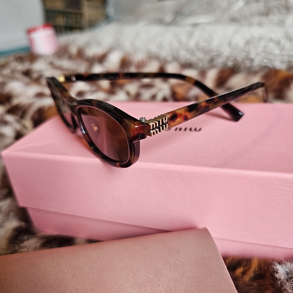 Miu Miu Women's Tortoiseshell Cat-Eye Sunglasses - Brown Lenses 😎